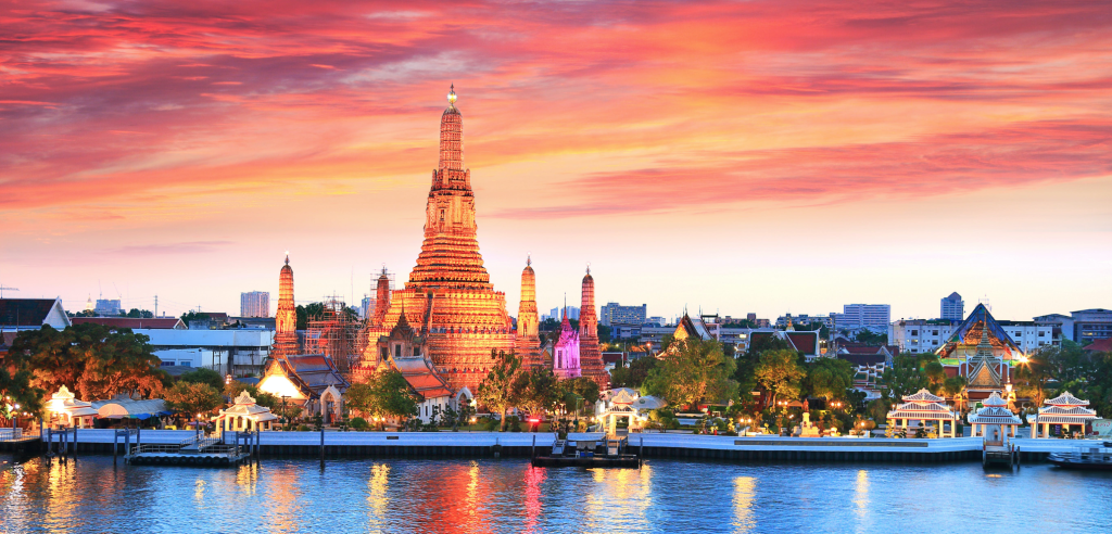 Wat Arun and the Chao Phraya River at sunset