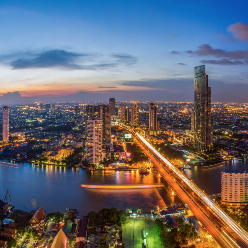 Bangkok buildings and river at dusk