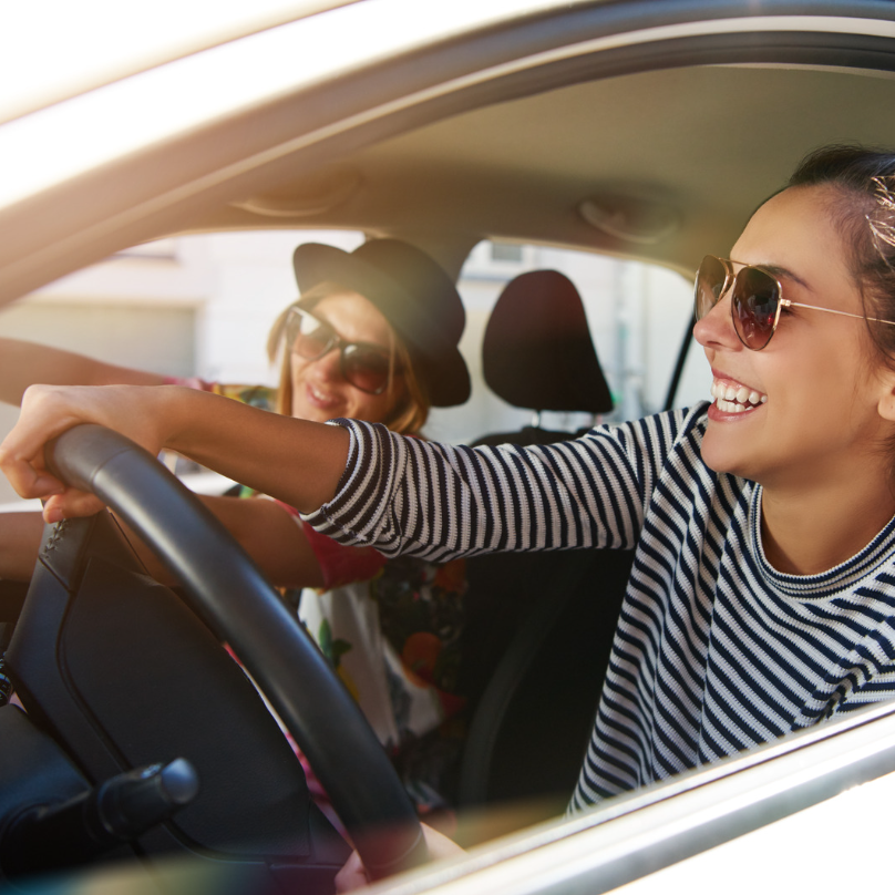 Travellers setting out in a rental car