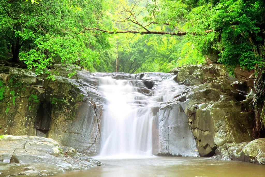 Water flowing over rocks at Pala-U Waterfall